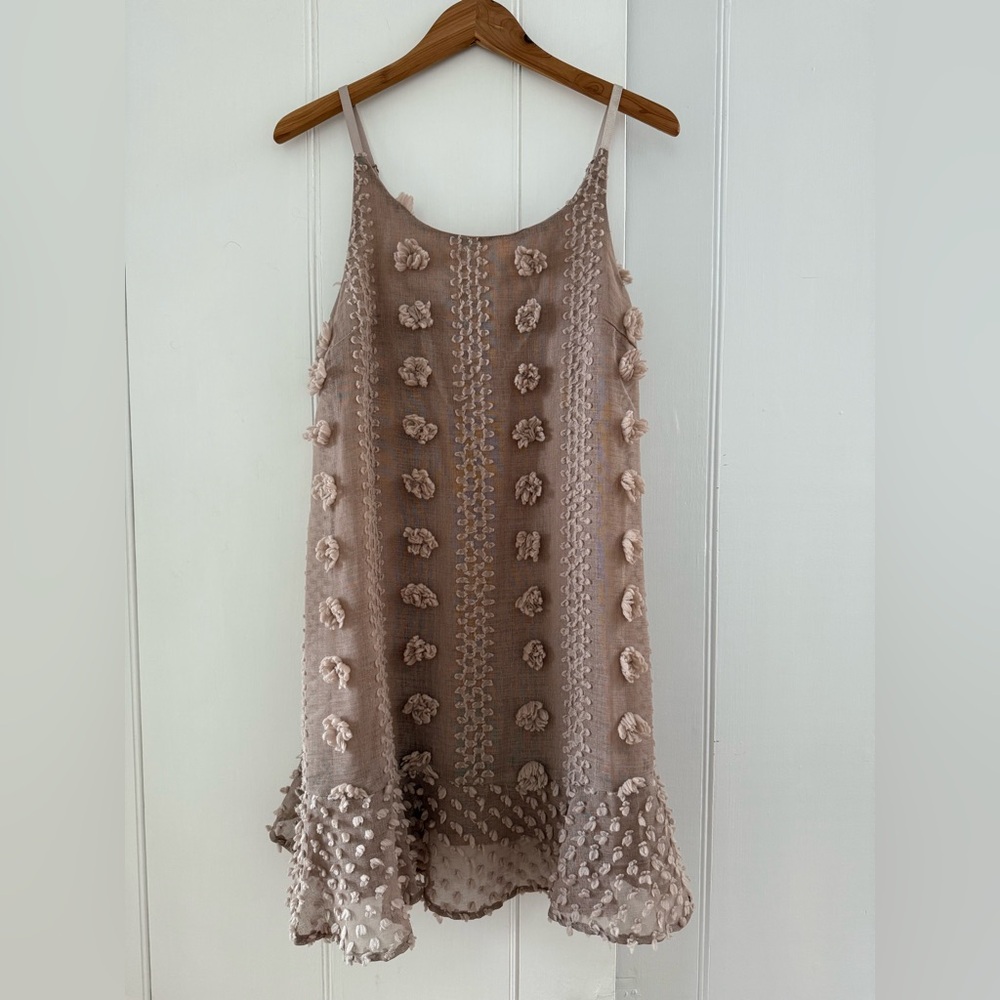 Elegant Beige Sleeveless Dress with Floral Accents